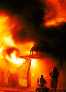 Bowling Green, Ky., fire fighters battle an early moring blaze in an abandoned building on Boatlanding Road.